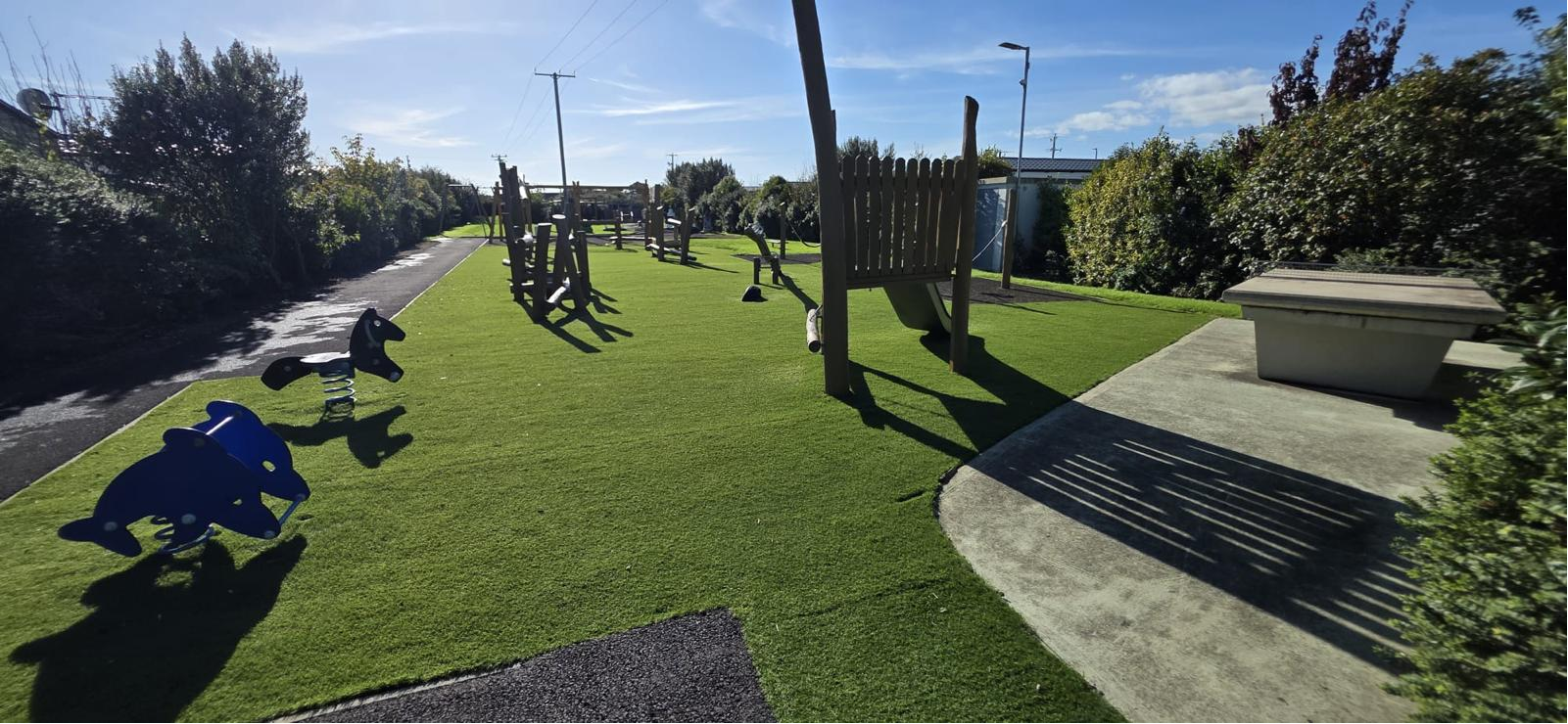 Playground at Central Holiday Park Rosslare with spring riders and wooden play equipment